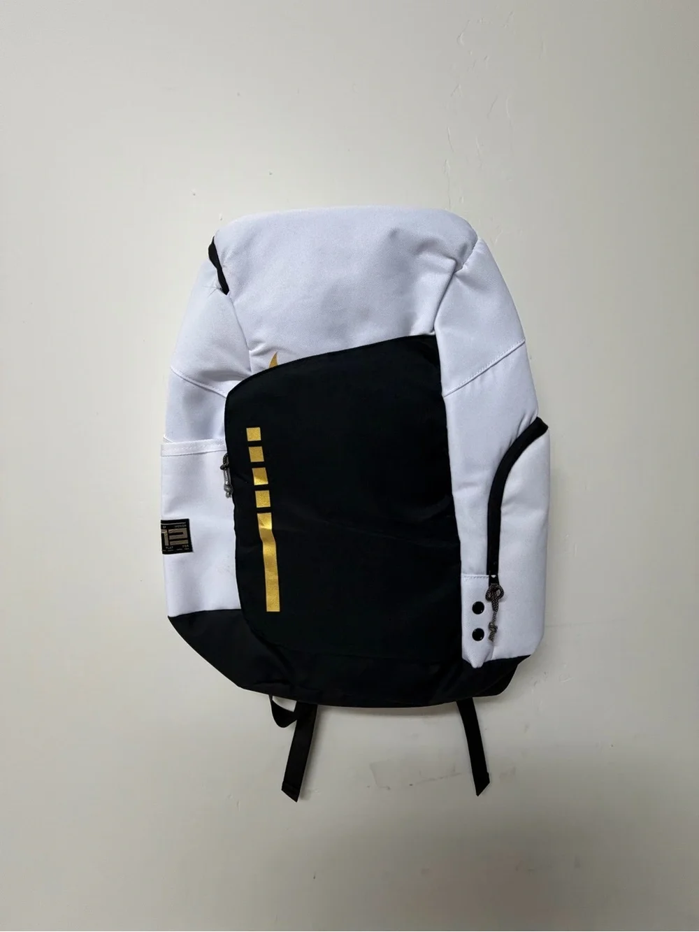 Men's Two-Tone White & Black Backpack with Gold Accent